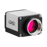 IDS U3-3990SE Rev.1.2 USB 3.0 machine vision camera with a C-mount lens port, showing its compact industrial housing.